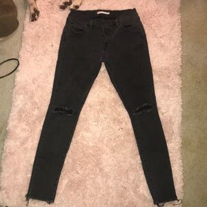 Size 31 black ripped jeans